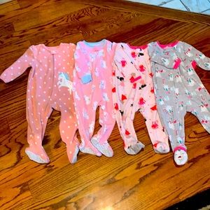 4 pair of Carters fleece zip up onesie footed sleepers 12 months.